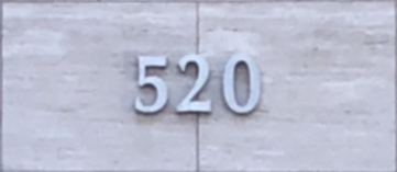 The address plate at 520 Newport Center Drive, Newport Beach, California